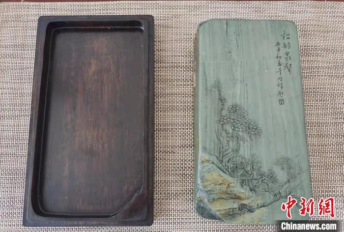 圖為盧保勝為提升洮硯文化內(nèi)涵，制作“一硯一銘、一盒一拓”成品展示。　張婧 攝